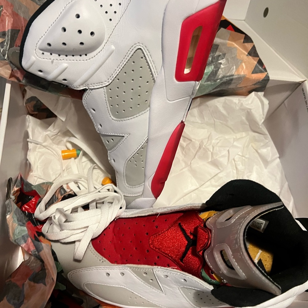 The Air Jordan 6 “Hare” Neutral gray color with white, black and red.